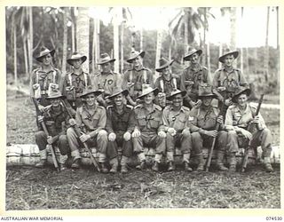 MADANG, NEW GUINEA. 1944-07-08. PERSONNEL OF HEADQUARTERS C COMPANY, 24TH INFANTRY BATTALION. IDENTIFIED PERSONNEL ARE:- CORPORAL J.W. GREENWOOD (1); WARRANT OFFICER II, M.S. KINGSWELL (2); ..