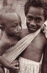 A child cares for sibling