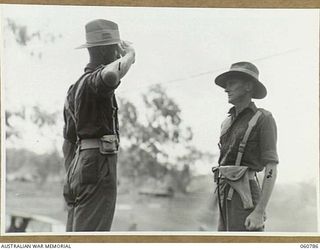 POM POM VALLEY, NEW GUINEA. 1943-11-27. SX1323 WARRANT OFFICER 1. J. G. PERCIVAL (2) REGIMENTAL SERGEANT MAJOR OF THE CHAMPION GUARD UNIT OF THE 2/10TH AUSTRALIAN INFANTRY BATTALION, 18TH ..