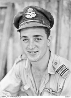 KIRIWINA, TROBRIAND ISLAND, PAPUA. 1944-01-27. PORTRAIT OF SQUADRON LEADER IAN LOUDON OF PORT MORESBY, PAPUA, THE COMMANDING OFFICER OF NO. 76 (KITTYHAWK) SQUADRON RAAF