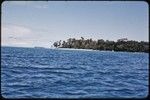 Village and palm trees, distant view of Munuwata Island