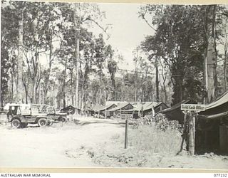 TOROKINA, BOUGAINVILLE ISLAND. 1944-11-25. THE FIELD CASH OFFICE, DEPUTY DIRECTOR OF MEDICAL SERVICES, ASSISTANT PROVOST MARSHAL, LEGAL BRANCH, AND AMENITIES, WHILE IN THE BACKGROUND IS THE UNIT ..