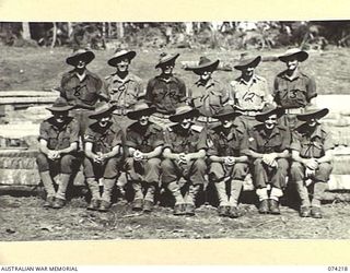 SIAR, NEW GUINEA. 1944-06-23. PERSONNEL OF COMPANY HEADQUARTERS, HEADQUARTERS COMPANY, 57/60TH INFANTRY BATTALION. IDENTIFIED PERSONNEL ARE:- PRIVATE W. HARDMAN (1); LANCE CORPORAL J. WITHAM (2); ..