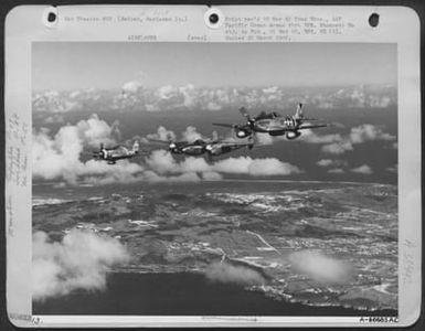 In Tight Formation Over Saipan, A Republic P-47, Lockheed P-38, And A North American P-51 Show What The Japs Can Expect To See In The Near Future Over Tokyo. P-47S Helped Take Marianas Bases From Which The P-38S Flew Strafing And Escort Missions To Help (U.S. Air Force Number A56685AC)