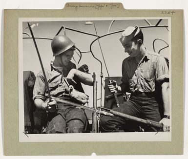 Photograph of Coast Guardsmen With a Puppy Named "Joe" and a Chicken Named "Japo"