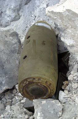 An M117, 750-lb bomb in position for detonation as a part of the 36th Explosive Ordnance Disposal (EOD) training on Tarague beach, Andersen Air Force Base (AFB), Guam