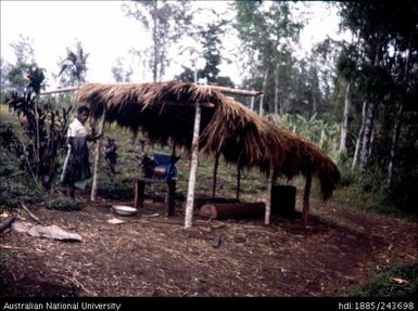 Man standing under a shelter