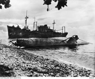 GUADALCANAL, BRITISH SOLOMON ISLANDS PROTECTORATE. C.1942-11. A JAPANESE MIDGET SUBMARINE SALVAGED BY A US NAVY CONSTRUCTION BATTALION (SEABEES) AFTER BEING SCUTTLED BY HER CREW DURING THE BATTLE ..