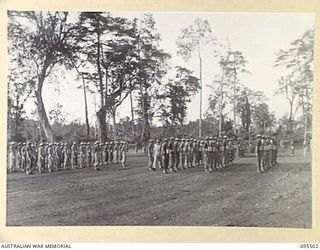TOROKINA, BOUGAINVILLE, 1945-08-18. SPECIAL PARADE OF B CORPS SIGNALS WHICH WON BOTH THE LOCAL CRICKET AND AUSTRALIAN RULES FOOTBALL COMPETITIONS HELD IN 2 CORPS AREA. THE UNIT WAS INSPECTED BY ..