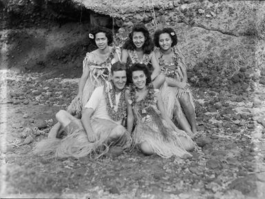 [Full-length group portrait of four pacific island women and a man]