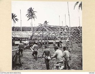 MUSCHU ISLAND, NEW GUINEA, 1945-09-09. JAPANESE SOLDIERS WORKING ON HOSPITAL SITE. ALL MATERIALS FOR BUILDING THIS HOSPITAL WERE SUPPLIED BY THE AUSTRALIAN ARMY. FOLLOWING THE SURRENDER OF THE ..