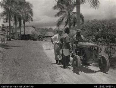 Teaching farmers to use tractor