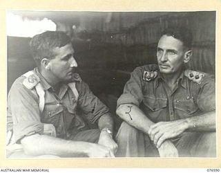 HOSKINS, NEW BRITAIN. 1944-10-10. NGX347 LIEUTENANT C.W. BLAKE, MM, AUSTRALIAN NEW GUINEA ADMINISTRATIVE UNIT (2) DESCRIBING THE AREA OF NEW BRITAIN IN WHICH THE 36TH INFANTRY BATTALION WILL BE ..