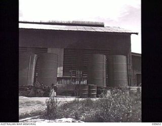 BOMANA, NEW GUINEA. 1943-11-08. THE BOMANA PUMPING STATION WHICH SUPPLIES PORT MORESBY AND THE SURROUNDING AREAS WITH WATER. THIS STATION DRAWS THE WATER FROM THE LALOKI RIVER, PUMPS IT TWELVE ..