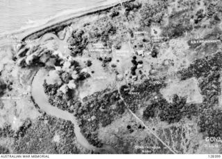GONA, BUNA AREA. 1942-07-31. AERIAL VIEW OF THE MISSION TEN DAYS AFTER THE JAPANESE LANDINGS IN THE AREA. (PHOTOGRAPH REPRODUCED IN OFFICIAL HISTORY VOLUME: S.W.P.A. FIRST YEAR, PAGE 130)