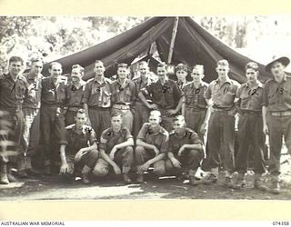 SIAR, NEW GUINEA. 1944-06-25.PERSONNEL OF NO.6 PLATOON, HEADQUARTERS COMPANY, 57/60TH INFANTRY BATTALION OUTSIDE THE UNIT Q STORE. IDENTIFIED PERSONNEL ARE:- VX147262 PRIVATE A.L. PINK (1); V300601 ..