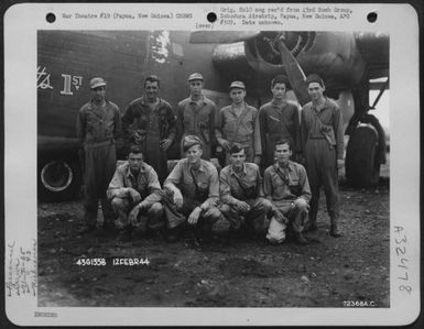 Major McDonnell and crew of the 65th Bomb Squadron, 43rd Bomb Group, pose by the Consolidated B-24 "Stugotts Ist" at Dobodura Airstrip, Papua, New Guinea. 12 February 1944. (U.S. Air Force Number 72368AC)