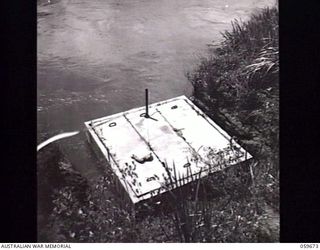 BOMANA, NEW GUINEA. 1943-11-08. WATER INTAKE FOR THE BOMANA PUMPING STATION ON THE BANK OF THE LALOKI RIVER