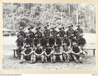 Group portrait of members of 18 Platoon, D Company, 58/59 Infantry Battalion. Identified, back row, left to right: Private (Pte) P Elphick; Pte S Keenan; Pte B Lollis; Pte D Berry; Pte C Northey; ..