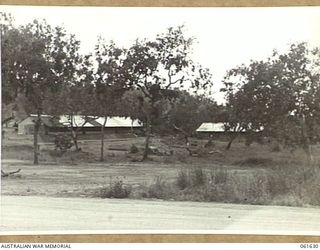 PORT MORESBY, NEW GUINEA. 1943-12-17. THE NEW SIGNALS OFFICE AT HEADQUARTERS, NEW GUINEA FORCE WHICH CONTAINS CYPHER OFFICE, TELEGRAPHIC EQUIPMENT, OPERATING ERMINALS FOR REMOTE CONTROLLED SETS AND ..