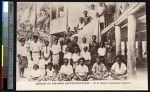 Father Chaize poses with newly baptized men, Papua New Guinea, ca.1900-1930