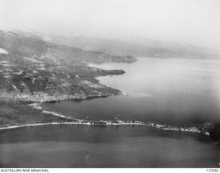 SALAMAUA, NEW GUINEA. 1943-08-03. MAIN TOWNSHIP OF SALAMAUA ON THE ISTHMUS. THE HARBOUR IS CALLED SAMOA HARBOUR