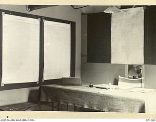 PORT MORESBY, PAPUA, NEW GUINEA. 1944-03-08. INTERIOR VIEW OF THE OFFICE OF "G" VISUAL TRAINING CENTRE, HEADQUARTERS, NEW GUINEA FORCE