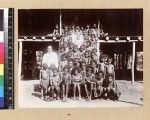 Group of students and teacher, Delena, Papua New Guinea, ca. 1905-1915