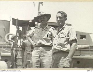 JACQUINOT BAY, NEW BRITAIN. 1944-11-21. 414977 FLIGHT LIEUTENANT I.J.L. WOOD (1) AND WARRANT OFFICER A.V. DAWSON (2) BOTH OF THE RAAF, CREW OF THE CATALINA FLYING BOAT WHICH RUNS THE MAIL SERVICE ..