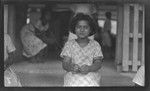 Cook Islands girl weaving on steps of school, Avarua, Rarotonga