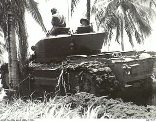 MADANG, NEW GUINEA. 1944-10-12. A CHURCHILL V TANK NEGOTIATING SLOPES DURING TESTS AT HQ 4 ARMOURED BRIGADE