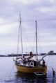 French Polynesia, sailboat anchored off shore of Tahiti Island