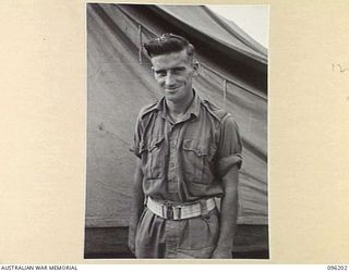 WIRUI MISSION, NEW GUINEA, 1945-09-07. PTE J.J. KENNA, NO. 5 SECTION, NO. 8 PLATOON, 2/4 INFANTRY BATTALION, BROTHER OF PTE E. KENNA, ALSO OF NO. 5 SECTION, NO. 8 PLATOON, 2/4 INFANTRY BATTALION, ..