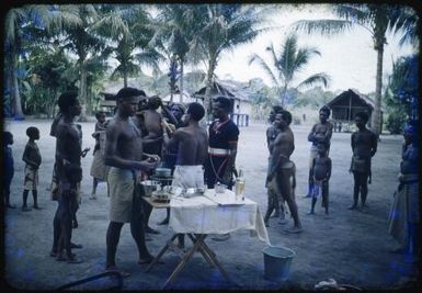 Medical officers immunising children, Papua New Guinea, 1951 / Albert Speer