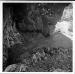 Three squares in cave of Te Ana Pu, Aukena, laid out and ready for excavation, viewed from above, Don outside; probably best negative