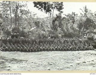 KILIGIA, NEW GUINEA. 1944-03-16. MEMBERS OF A SQUADRON, 1ST TANK BATTALION, 5TH DIVISION, WITH MATILDA TANKS AT THE BACKGROUND