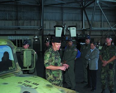 US Air Force Lieutenant Colonel Fred Cheney shows Air Force Board members equipment that is used in the field by 25th Air Support Operations Squadron, Hickam Air Force Base, Hawaii