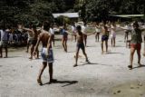 French Polynesia, school children exercising outdoors on Tahiti Island