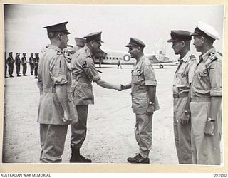 JACQUINOT BAY, NEW BRITAIN. 1945-07-01. HIS ROYAL HIGHNESS, THE DUKE OF GLOUCESTER, GOVERNOR-GENERAL OF AUSTRALIA (2), MEETING LIEUTENANT COLONEL MACLELLAN, COMMANDER ROYAL NEW ZEALAND AIR FORCE ..