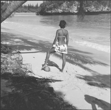 A women on a beach posing in a smiwsuit, New Caledonia, 1967 / Michael Terry