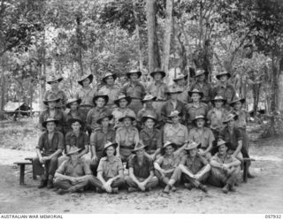 DOBODURA, NEW GUINEA. 1943-10-11. GROUP PORTRAIT OF GENERAL DUTIES (MESS STAFF AND BATMEN), HEADQUARTERS, 11TH AUSTRALIAN DIVISION. LEFT TO RIGHT, FRONT ROW:- VX102451 PRIVATE R DEAN; NX84578 ..