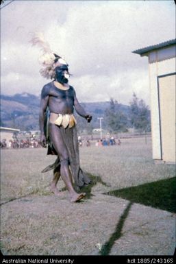 Man in traditional dress attending the election