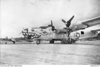 NADZAB, MARKHAM VALLEY, NEW GUINEA. 1944-02. UNITED STATES 5TH AIR FORCE (HEAVY BOMBER GROUP) WITH WHICH UNIT NO 1 WIRELESS UNIT RAAF WAS WORKING AT THAT TIME. A B24 LIBERATOR HEAVY BOMBER OF THE ..