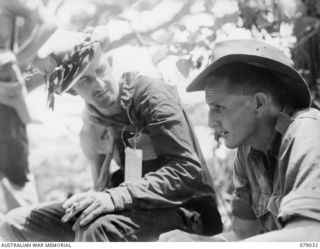 TSIMBA RIDGE, BOUGAINVILLE ISLAND. 1945-02-06. QX49678 PRIVATE R. CROSS (LEFT) AND QX42446 PRIVATE S. H. TURNER, MEMBERS OF 31/51ST INFANTRY BATTALION WHO WERE WOUNDED DURING AN ACTION AGAINST THE ..