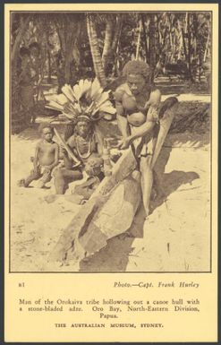 Man of the Orokaiva tribe hollowing out a canoe hull with a stone-bladed adze, Oro Bay, Northern-Eastern Division, Papua / photo. Capt. Frank Hurley