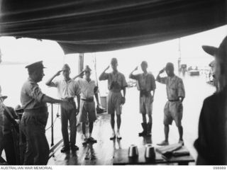 MUSCHU ISLAND, NEW GUINEA. 1945-11-26. ELEVEN HUNDRED JAPANESE TROOPS OF 18 JAPANESE ARMY LEFT THE WEWAK AREA ON THE JAPANESE CRUISER KASHIMA TO RETURN TO JAPAN. THEY ARE THE FIRST JAPANESE TROOPS ..
