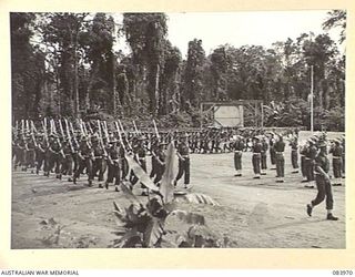 TOROKINA, BOUGAINVILLE, SOLOMON ISLANDS. 1944-12-15. 47 INFANTRY BATTALION, 29 INFANTRY BRIGADE TROOPS MARCH FROM THE PARADE GROUND AT THE CONCLUSION OF A PARADE REVIEWED BY MAJOR GENERAL W. ..