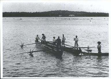 Canoes off Aitutaki Island