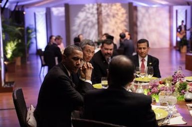 Barack Obama and Michelle Obama attend the Leaders Dinner at the APEC summit in Honolulu, Hawaii, November 12, 2011