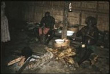 Men mashing food